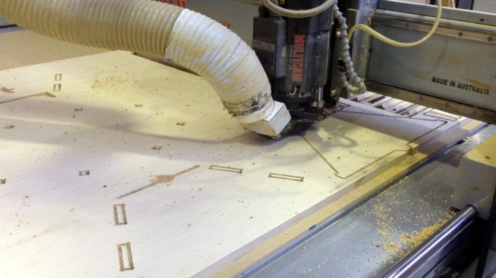 The CNC cutting machine in action, creating the pieces for my hive.