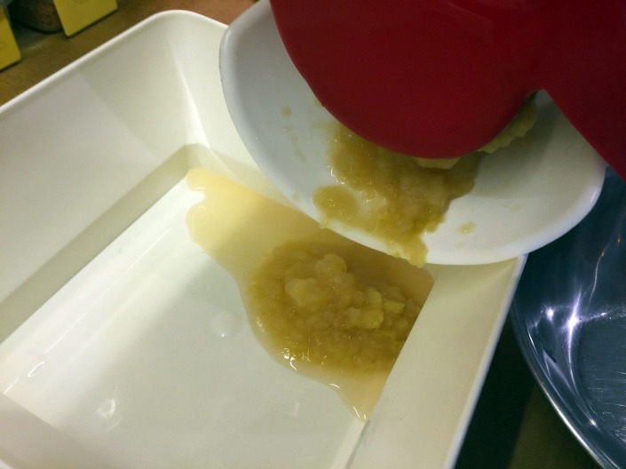 Passing the apple pulp through my passata machine, to create a smooth sauce